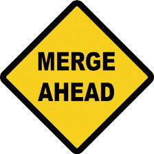 merger ahead road sign